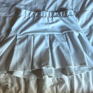 white tennis skirt